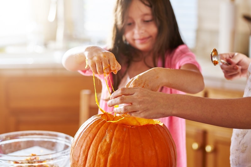 Halloween Cleaning Tips pumpkin carving mess